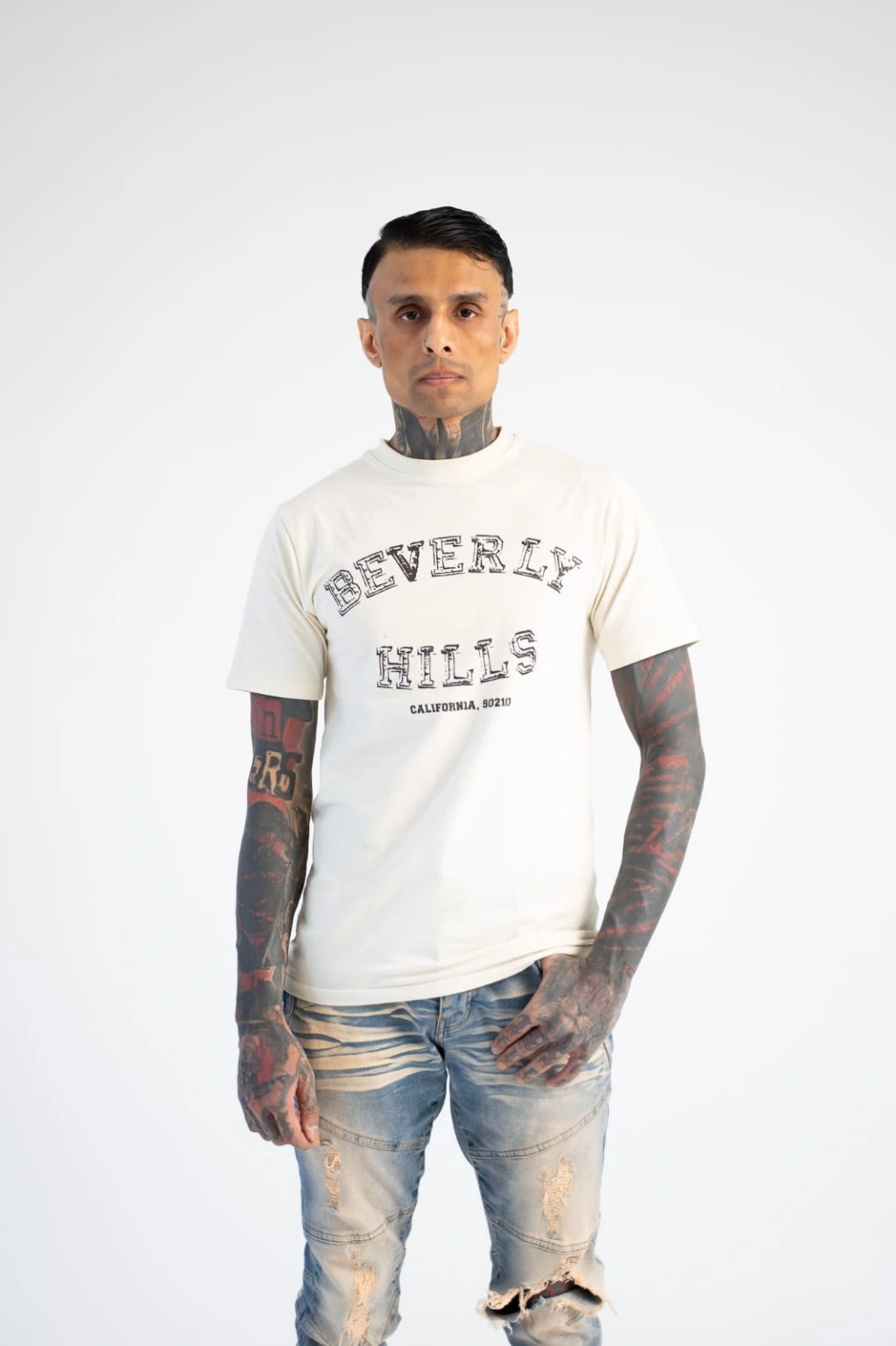 Studio portrait of Shefan, founder of Raw By Design.